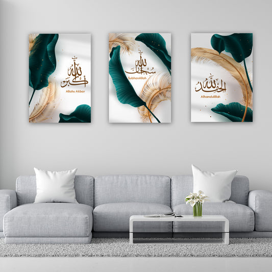 Three abstract art prints with Arabic text on a wall above a gray sofa.