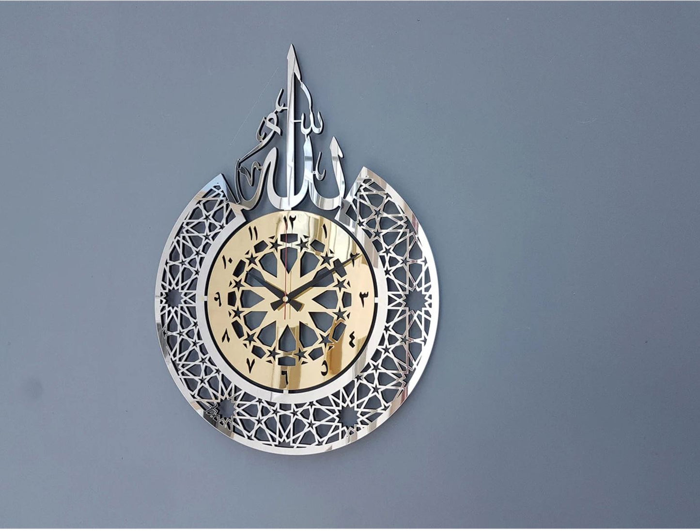 Enhance your living space with the a perfect fusion of faith and functionality. This elegantly designed wall clock features the revered name of Allah (SWT) in Arabic calligraphy, serving as both a timepiece and a spiritual centerpiece for your home.
