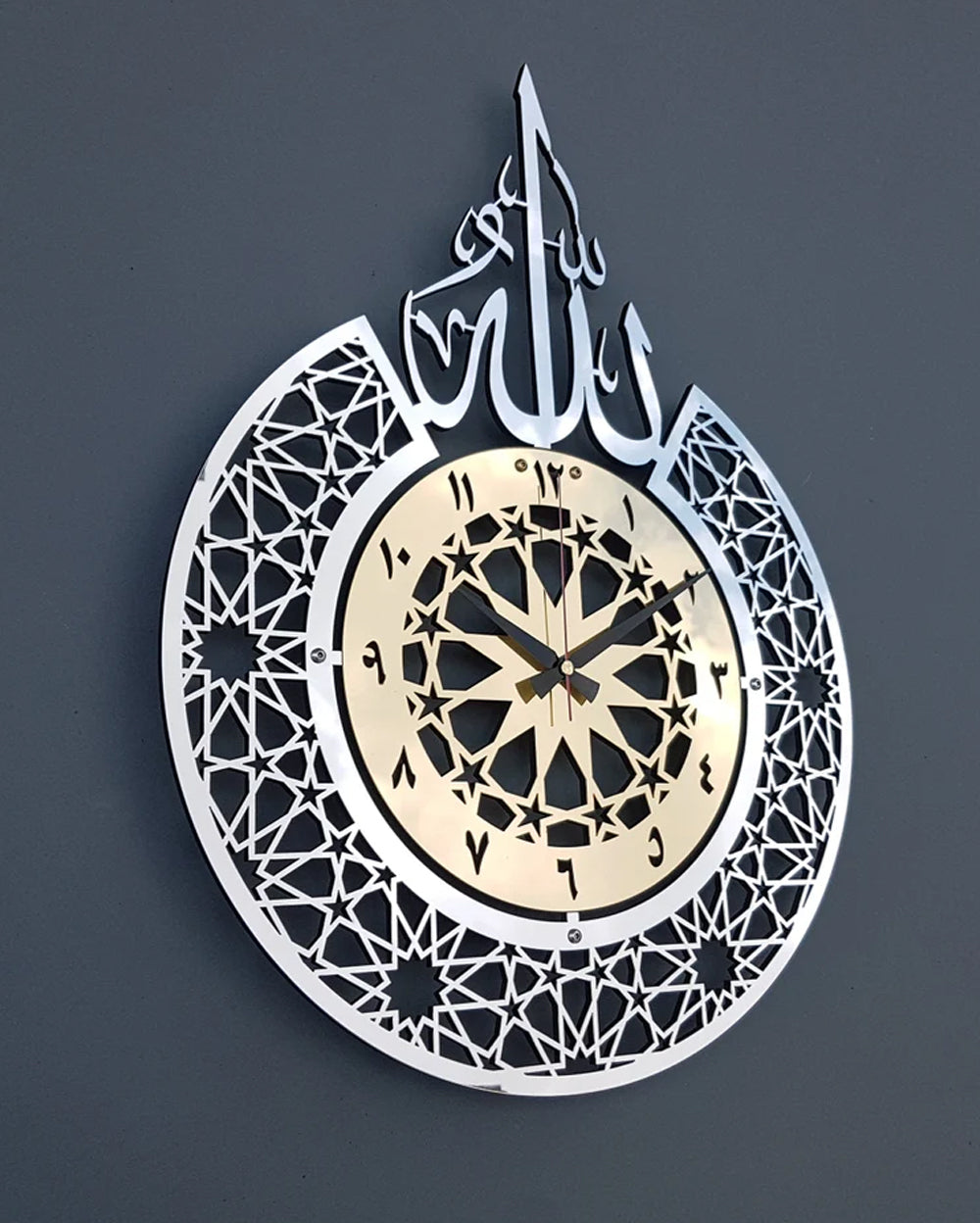 Enhance your living space with the a perfect fusion of faith and functionality. This elegantly designed wall clock features the revered name of Allah (SWT) in Arabic calligraphy, serving as both a timepiece and a spiritual centerpiece for your home.