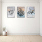 Three abstract art pieces with calligraphic designs on a white wall.