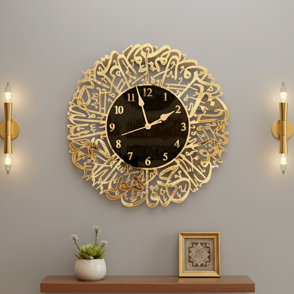 "Premium Surah Al-Ikhlas Islamic wall clock in elegant black and gold acrylic design, featuring intricate Arabic calligraphy. A modern decorative clock that adds spiritual beauty to any living room or prayer space."
